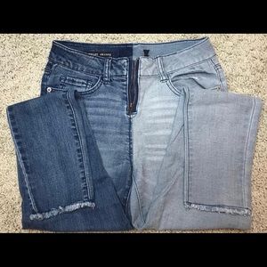 Two toned jeans, black jeans, and white jeans